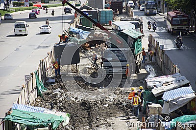 Asian thai workers and heavy machinery working builder new build at construction site of Thailand Editorial Stock Photo