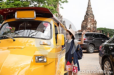 Asian tourist girl query for the way with old man driver taxi Stock Photo