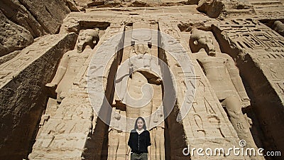 Happy Asian tourist woman travel to Egypt Abu Simbel internation historic handmark Stock Photo