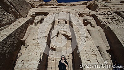 Happy Asian tourist woman travel to Egypt Abu Simbel internation historic handmark Stock Photo