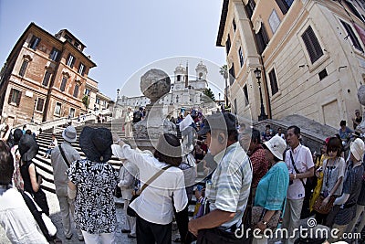Asian tourists at Piazza Spagna in Rome, Italy. Editorial Stock Photo