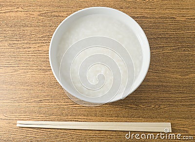Bowl of Asian Boiled Rice or Rice Porridge Stock Photo