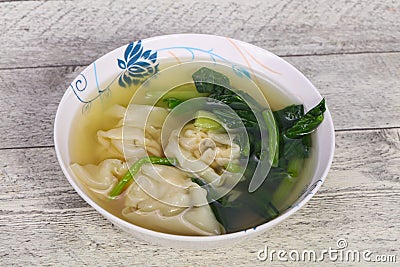 Asian traditional Wonton soup with herbs Stock Photo