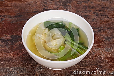 Asian traditional Wonton soup with herbs Stock Photo