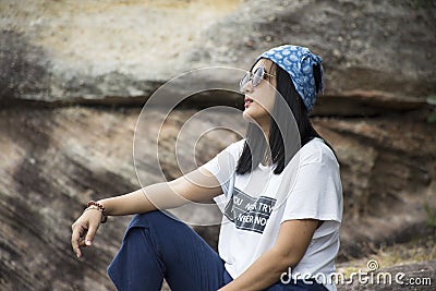 Asian travelers thai women travel and posing at Sao Chaliang in Pha Taem National Park Stock Photo