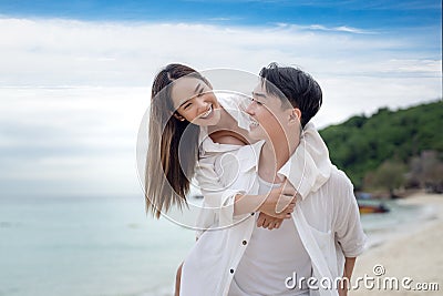 Asian traveller couple playing and sweet together Stock Photo