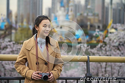 Asian traveller girl travel in seoul city with her digital camera Stock Photo