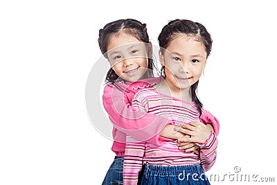 Asian twin sisters very happy look at camera Stock Photo