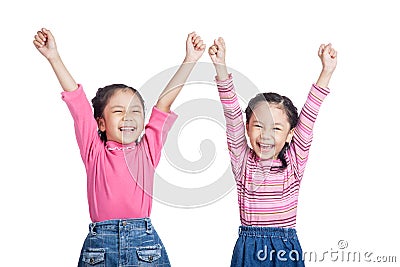 Asian twin sisters very happy rise hands up Stock Photo