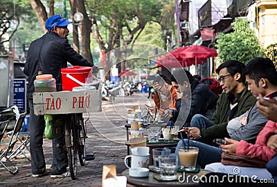 Asian vendor selling soft and fresh tofu Editorial Stock Photo