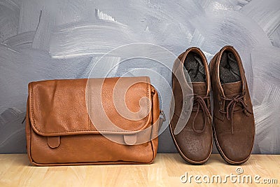 Asian vintage style men clothing and jeans and bag put on wooden table Stock Photo