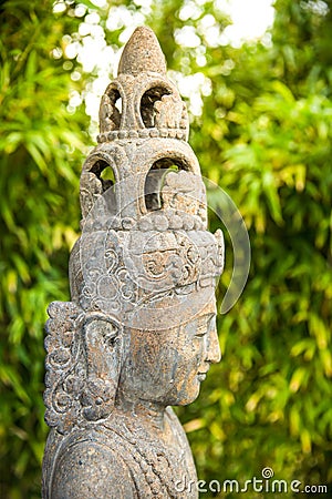 Asian Wisdom Statue Decorating a Meditation and Relaxation Temple Garden Stock Photo