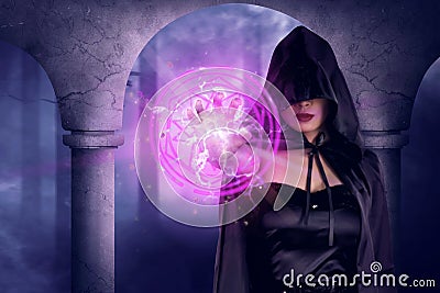 Asian witch woman show magic pentagram in his hand Stock Photo