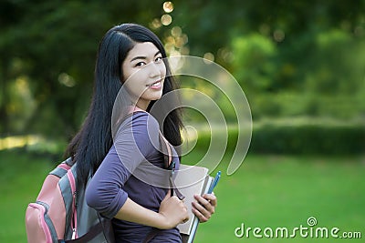 Asian woman college student on campus Stock Photo