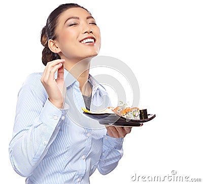 Asian woman eating sushi. Shallow depth of field, focu Stock Photo