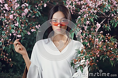 Asian woman fashion close-up portrait outdoors Stock Photo