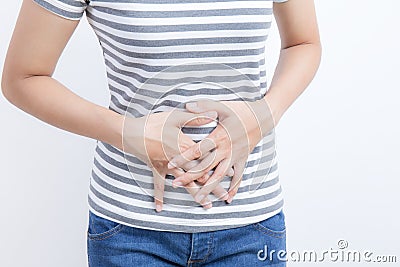 Asian woman having stomachache on white background Stock Photo