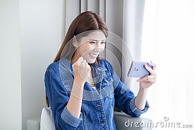 Woman Play Games With Phone Stock Photo