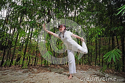 Asian Woman practising Yoga in Woods 3 Stock Photo