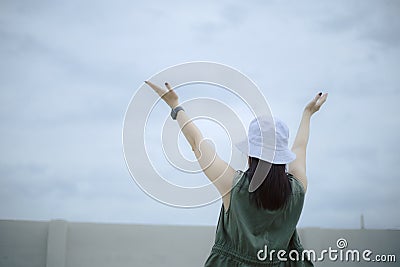 Asian woman praying morning outdoor, Hands folded in prayer concept for faith, spirituality and religion, Church services online Stock Photo