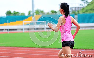 Asian woman runner running Stock Photo