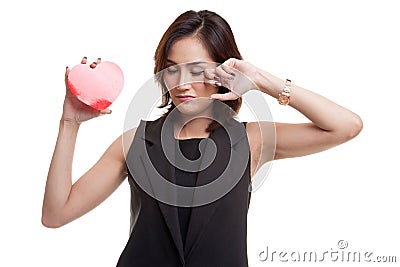 Asian woman sad and cry with red heart. Stock Photo