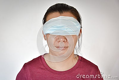 Asian woman sample to wear a wrong position mask Stock Photo