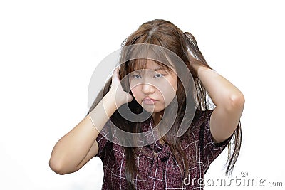 Asian woman scratching itchy head with frustrate face expression Stock Photo