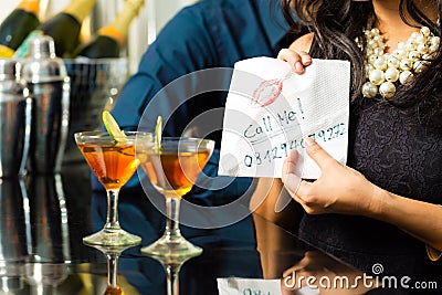 http://thumbs.dreamstime.com/x/asian-woman-seduces-man-restaurant-women-men-gives-him-her-number-napkin-32378731.jpg