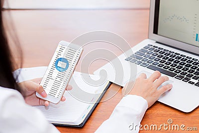 Asian woman sending email contact. gesture of finger pressing send on mobile phone Editorial Stock Photo