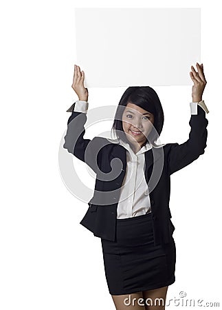 Asian woman showing blank billboard sign banner Stock Photo