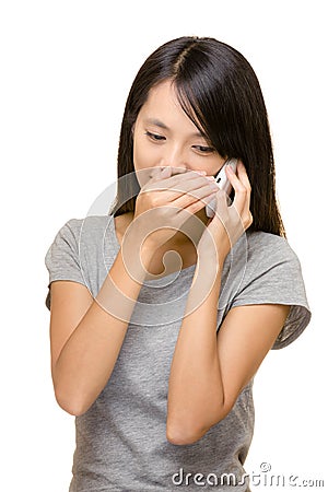 Asian woman talk to phone secretly Stock Photo