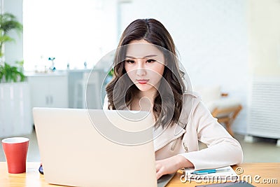 Asian woman telework at home Stock Photo