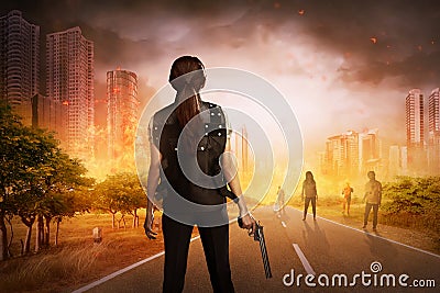 Asian woman with vest and gun Stock Photo