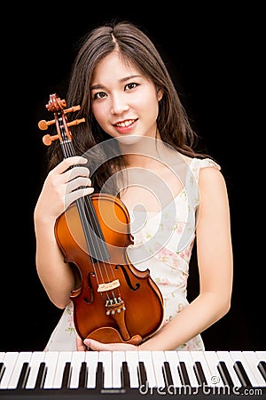 Asian woman and violin Stock Photo