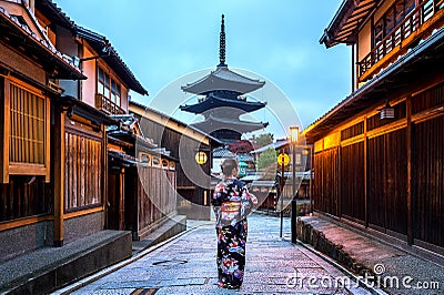 Asian woman wearing japanese traditional kimono at Yasaka Pagoda and Sannen Zaka Street in Kyoto, Japan Stock Photo