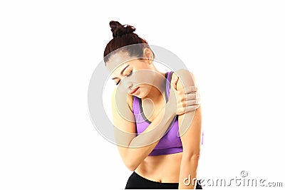 Asian woman wearing sport wear squeeze her hand on her arm .young woman arm pain during exersice isolate on whiite background Stock Photo
