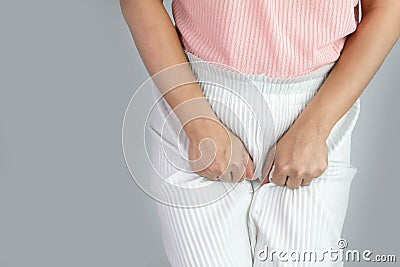 Asian women have problems with hidden spots, Have itching from vaginal discharge. Healthcare and medical concept Stock Photo