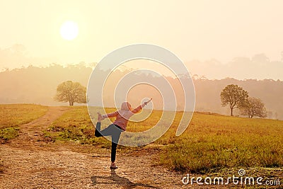 Asian women with morning exercises yoga postures Stock Photo