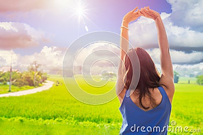 Asian women relax arm stretching wakeup in the morning rural Stock Photo