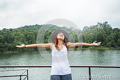 Asian women relax in the holiday. In the natural atmosphere, mountain forest Stock Photo