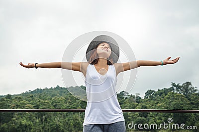 Asian women relax in the holiday. In the natural atmosphere, mountain forest Stock Photo