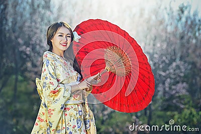 Asian women wearing traditional Japanese kimono Stock Photo