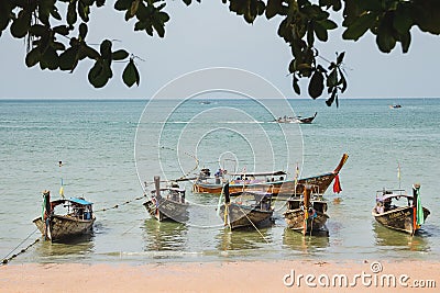 Asian wooden passenger boats on the beach. Editorial Stock Photo
