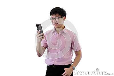 Asian young businessman has standing and playing phone with happy on isolated on wihte background Stock Photo