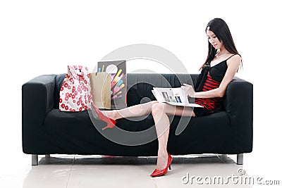 Asian young lady reading Stock Photo