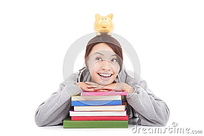 Asian young student thinking to earn money with piggy bank Stock Photo