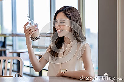Asian woman drink bubble tea Stock Photo