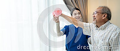 Asian young woman nurse at home nursing care support disabled senior elderly man. Caregiver Therapist serve physical therapy for o Stock Photo