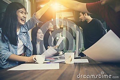 Asian younger freelance teamwork job successfull happiness emot Stock Photo